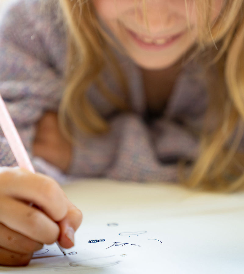 kid artist sketching