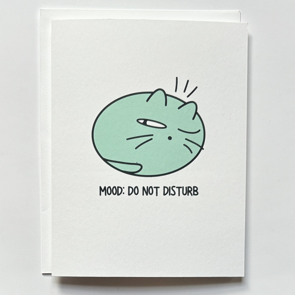 cat illustration with one eye open and do not disturb mood words