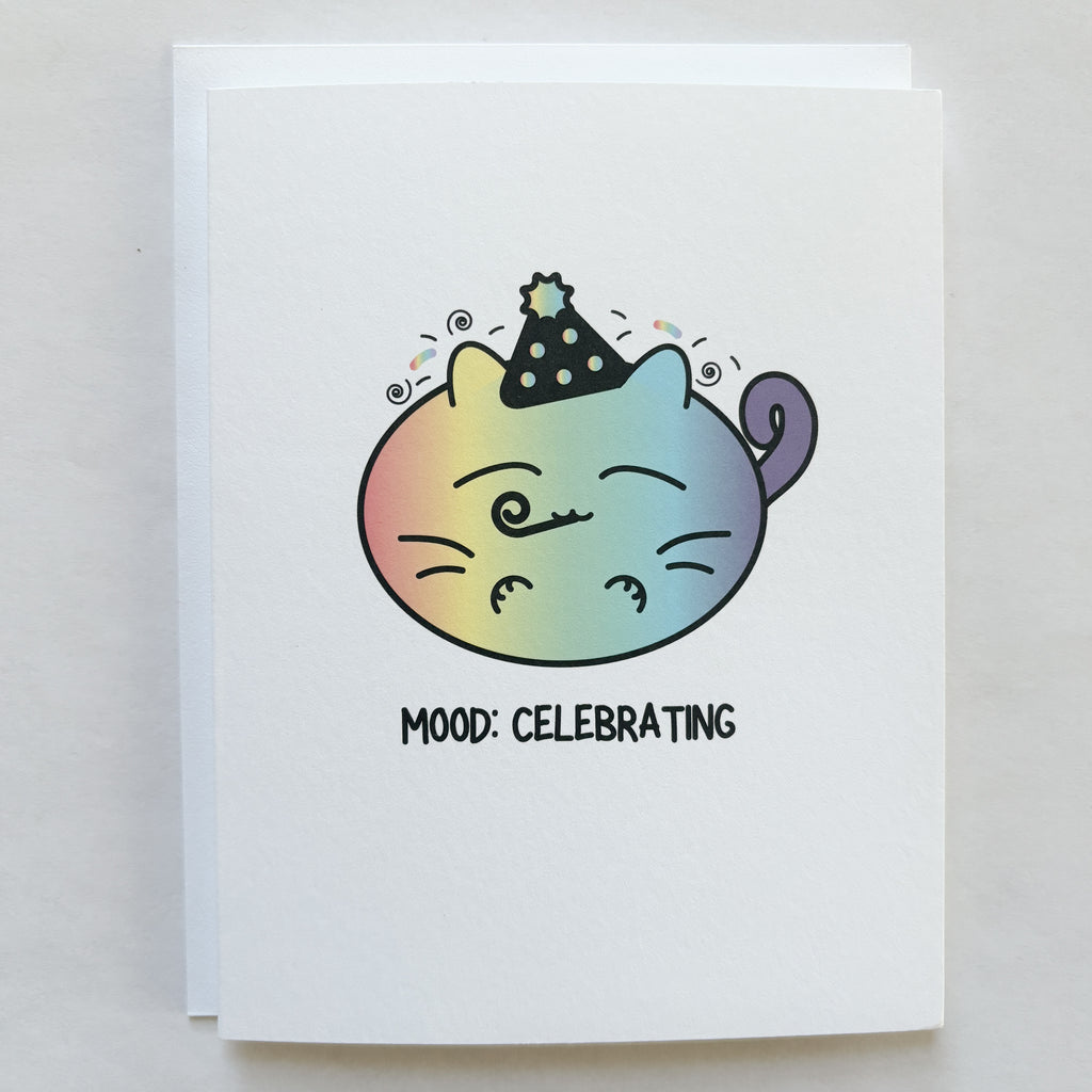 cat with a party hat and mood celebrating words