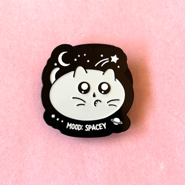 enamel pin of cat with Mood: spacey text