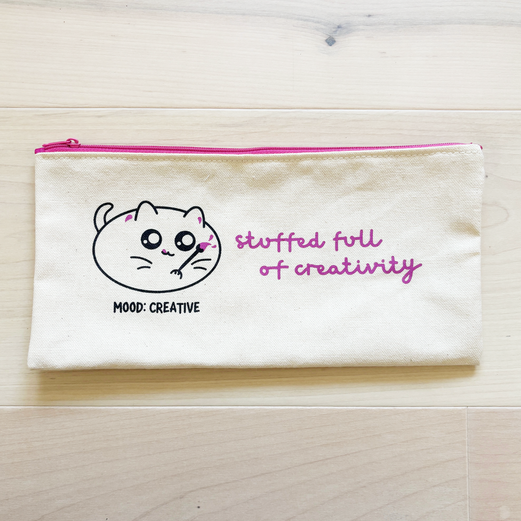 pencil pouch with text "stuffed full of creativity" and creative cat mood illustration with a paint brush